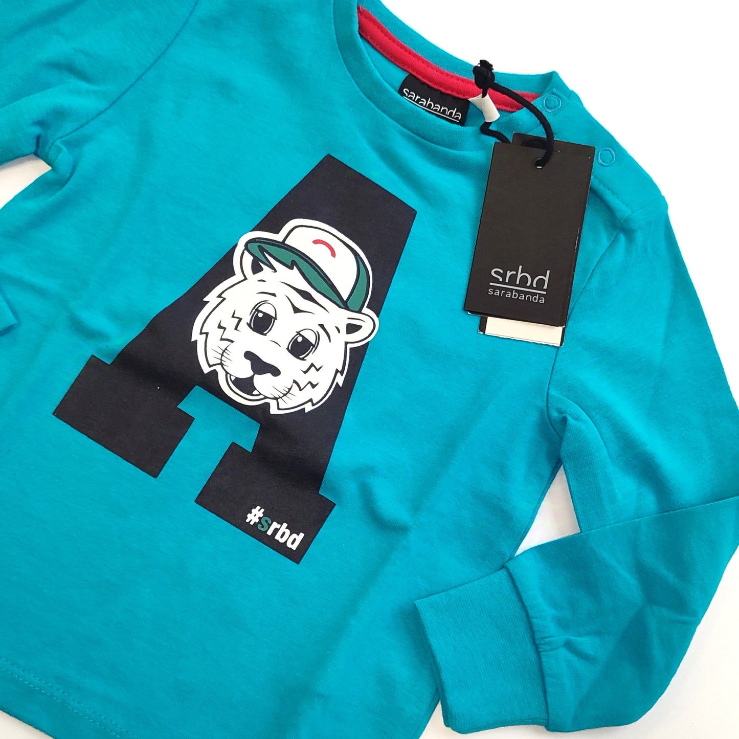 Maglia girocollo in cotone con polsino