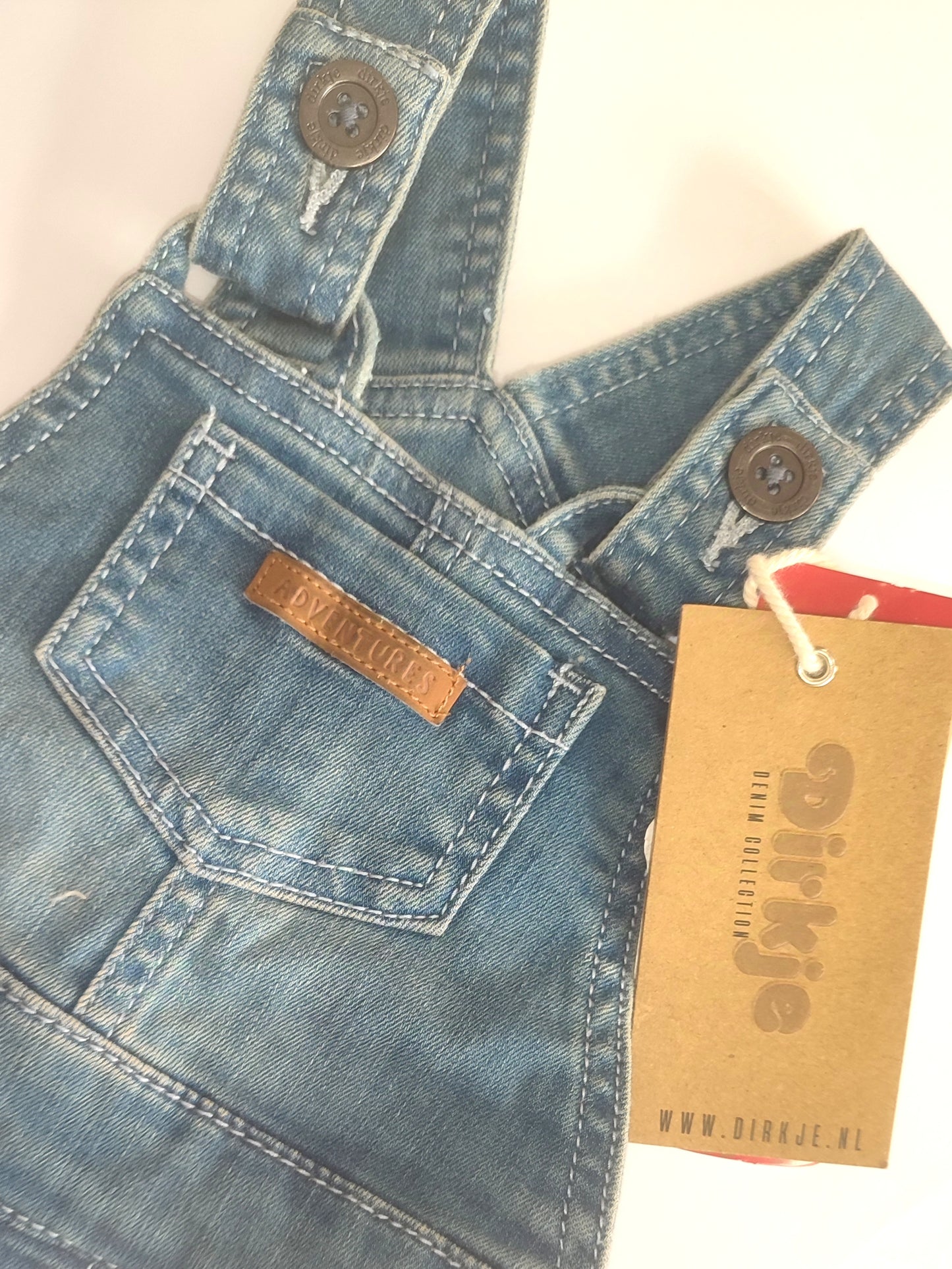 Salopette di jeans neonato con apertura bottoni nel cavallo