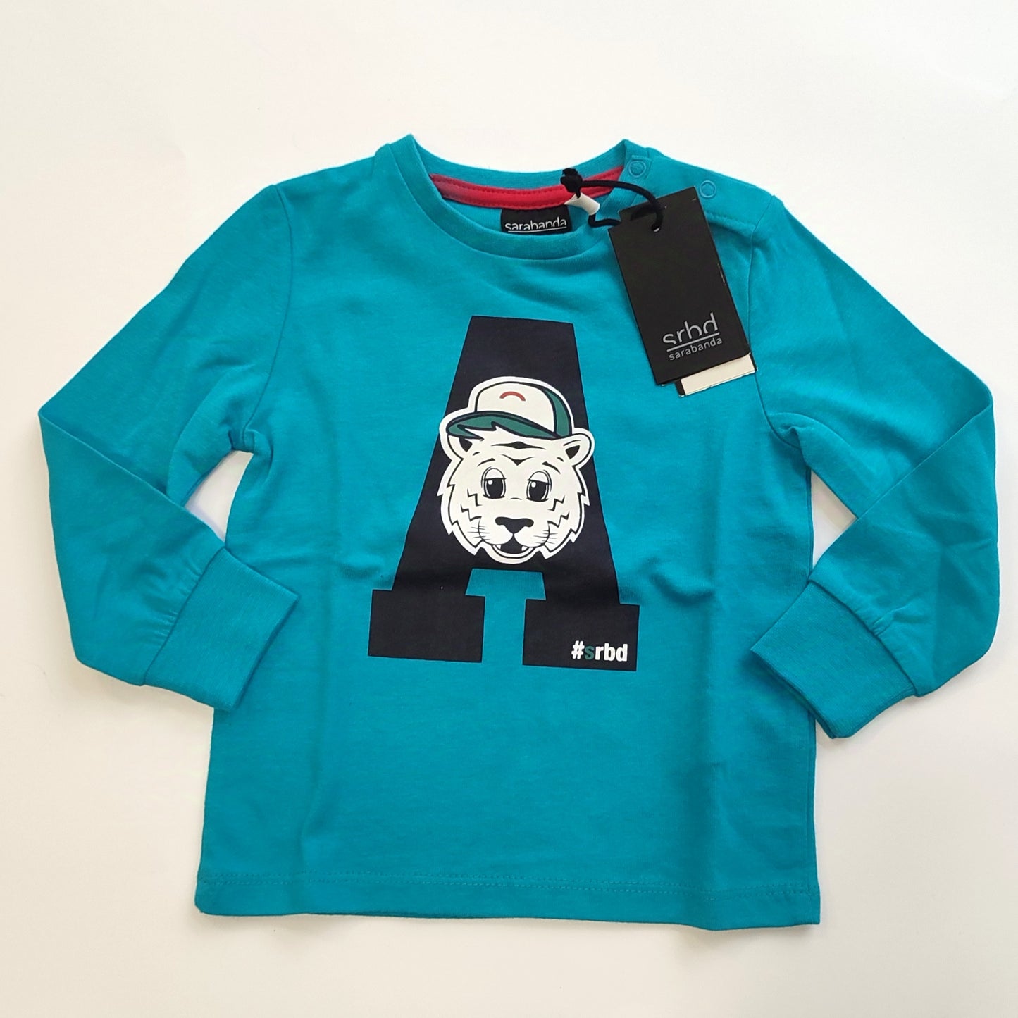 Maglia girocollo in cotone con polsino